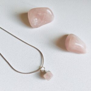 Rose Quartz hexagonal crystal mini pendant, on a silver plated chain.