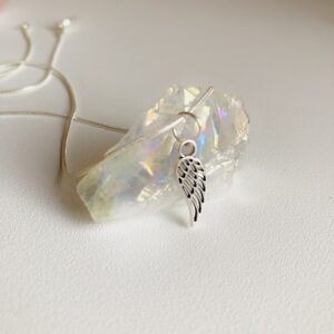 Silver plated feather necklace.