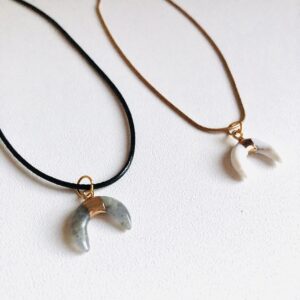 Labradorite moon shaped crystal necklace.