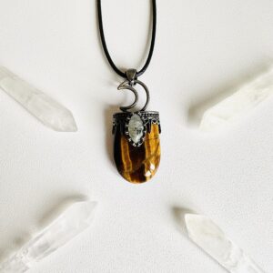 Tigers Eye crystal pendant with moon crescent topper.