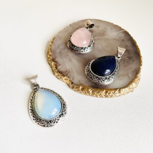 Teardrop shaped crystal pendants in Opalite, Rose Quartz & Lapis Lazuli.